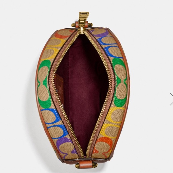 circle crossbody in rainbow signature canvas